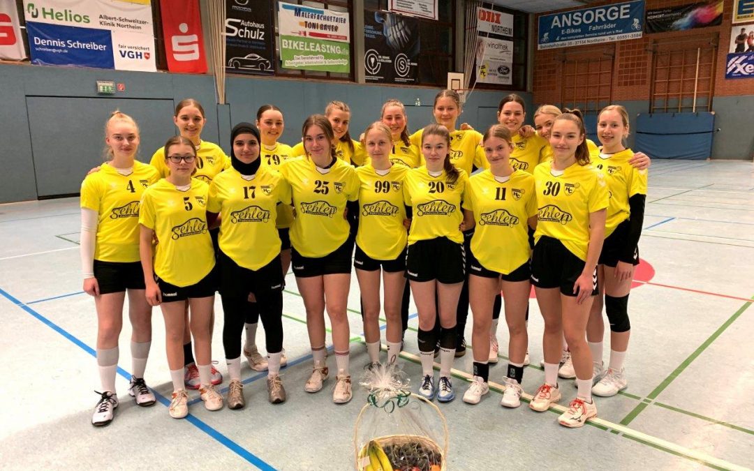 NHC weibliche B mit neuen Aufwärmshirts